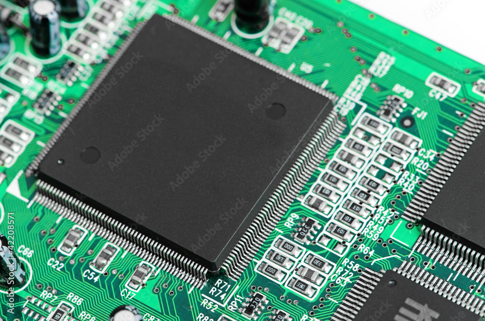 chip and plate on the green board computer chip and plate on the green board computer