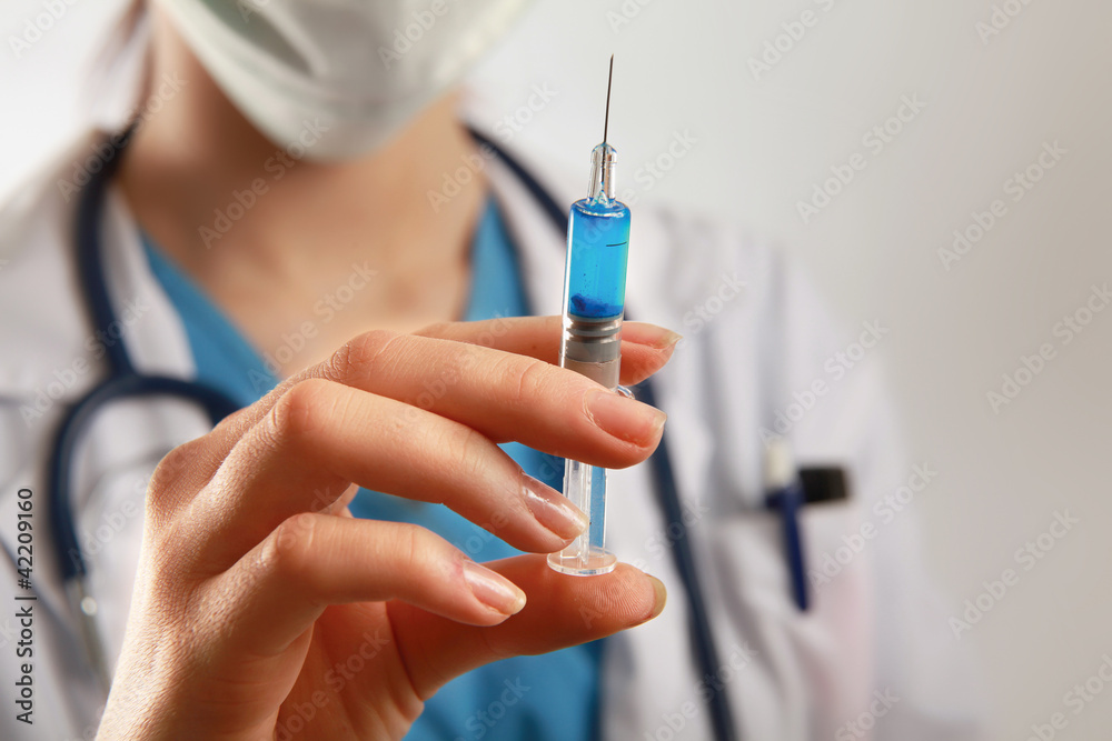 Woman having an injection Woman having an injection