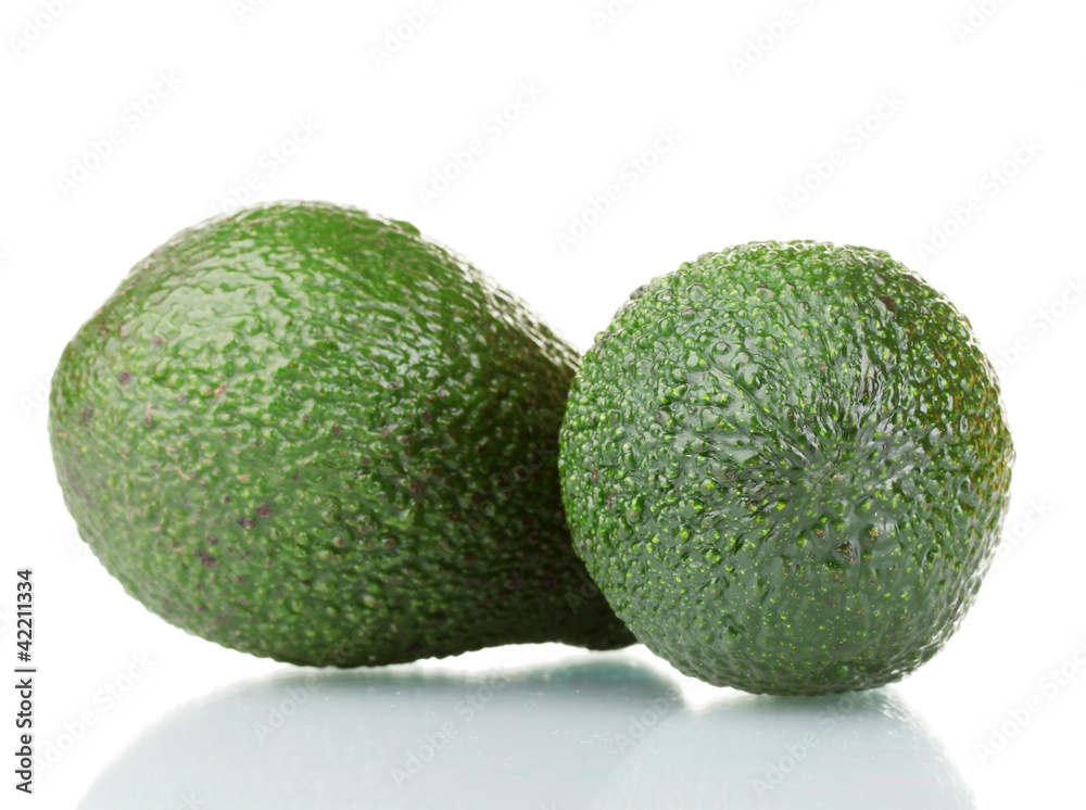 two ripe avocado fruits isolated on white two ripe avocado fruits isolated on white