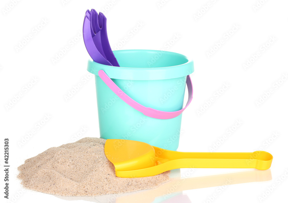 Children's beach toys and sand isolated on white Children's beach toys and sand isolated on white