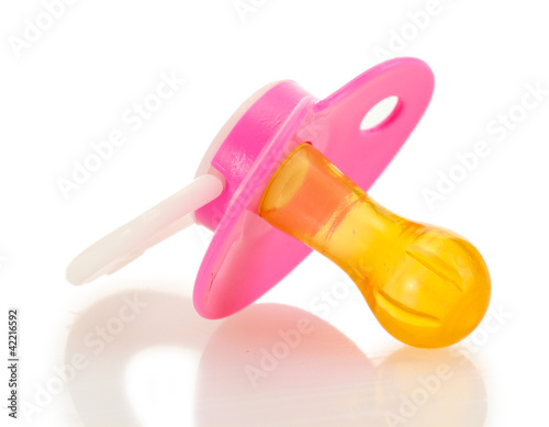 pink baby's pacifier isolated on white background photo