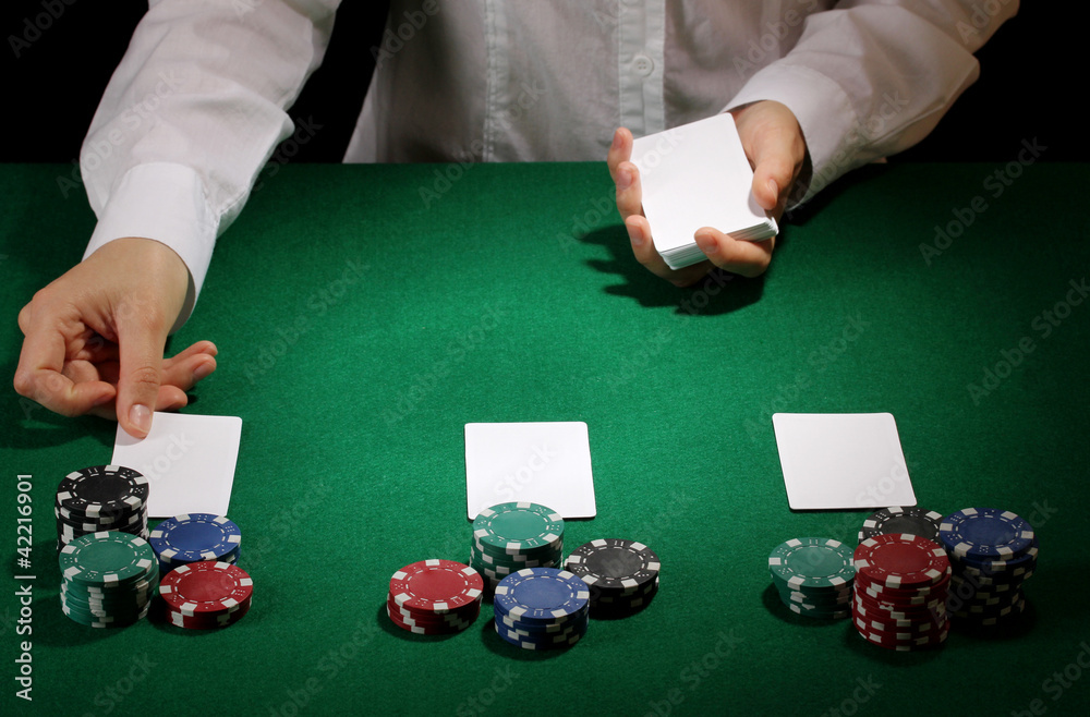Poker setting on green table Poker setting on green table