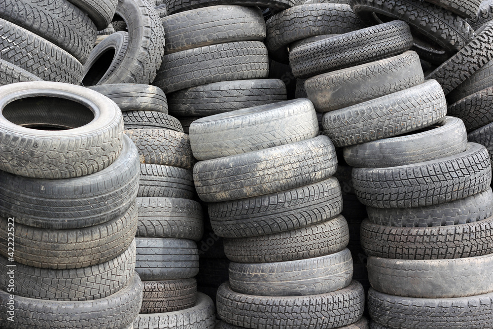 background with old tires on each other background with old tires on each other