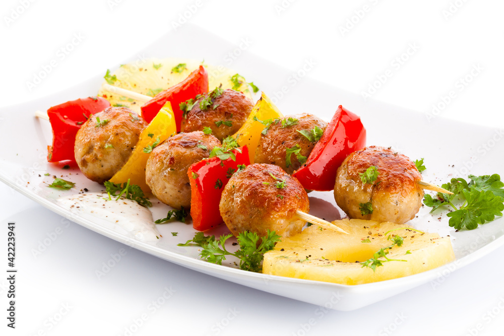 Grilled meat and vegetables on white background Grilled meat and vegetables on white background