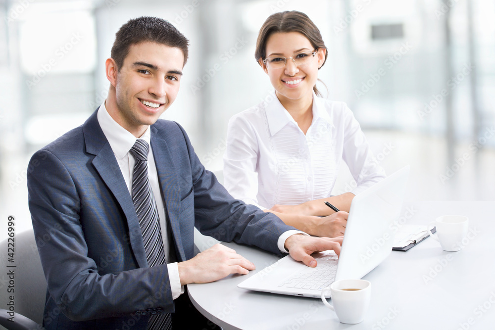 Business people working on their business project Business people working on their business project
