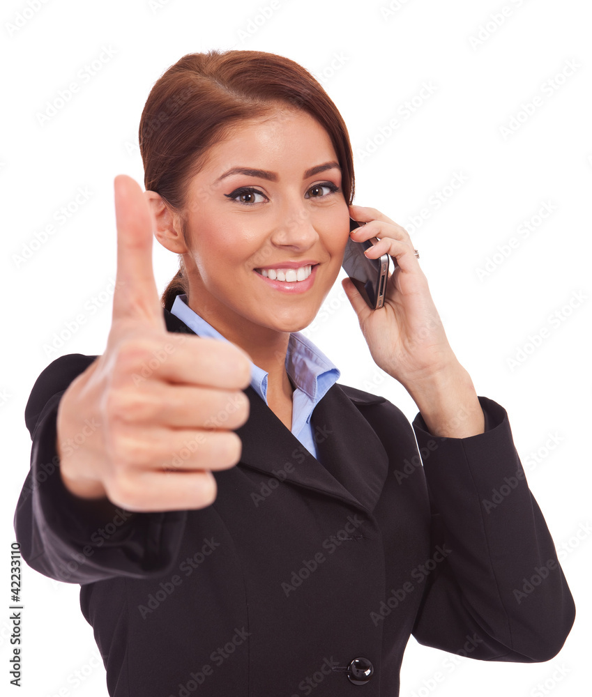 woman with phone and thumbs up gesture woman with phone and thumbs up gesture
