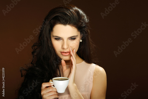 beautiful young girl  with  the cup of coffee