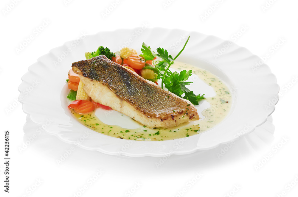 fish and begetables isolated on a white background fish and begetables isolated on a white background