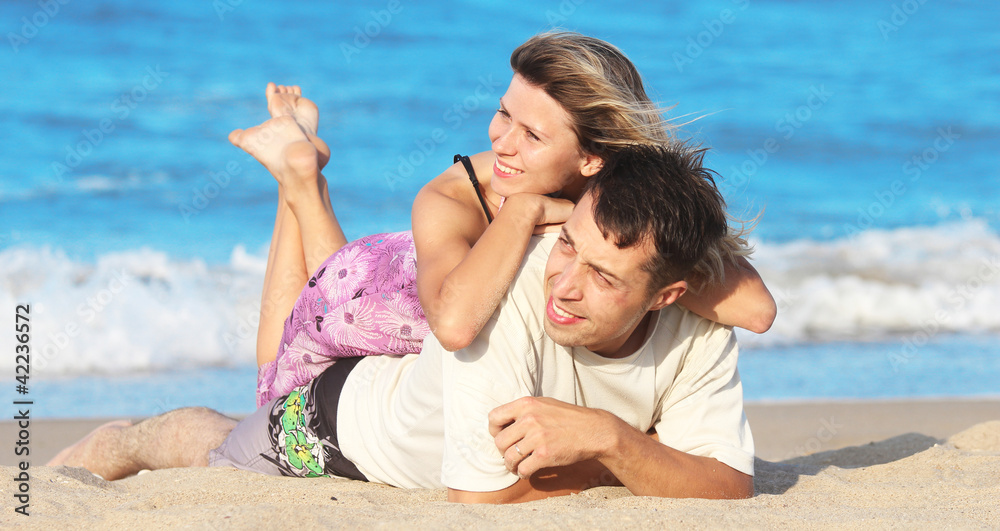 couple on the shore of the sea couple on the shore of the sea