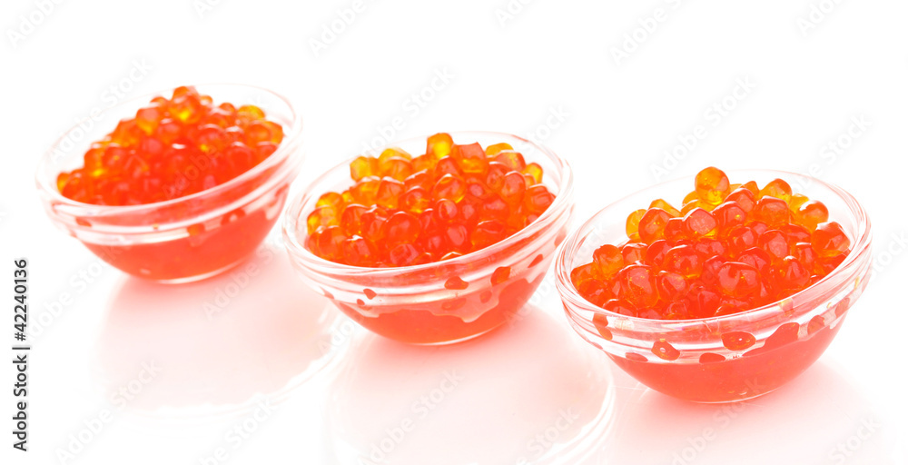Red caviar in glass bowls isolated on white Red caviar in glass bowls isolated on white