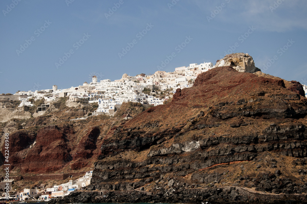Oia clinging to clifftop on the Island of Santorini Greece