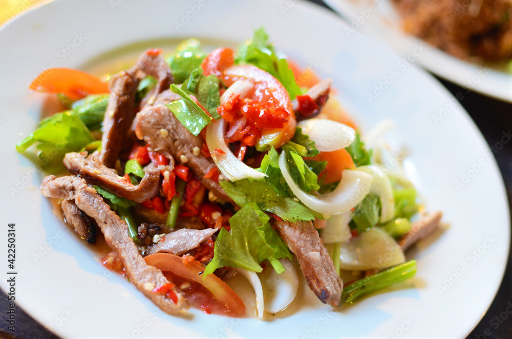 Spicy pork salad with vegetables