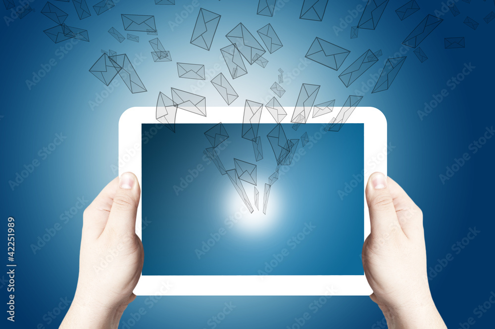 Hand Holding Tablet PC with Mail icon coming out from tablet PC Hand Holding Tablet PC with Mail icon coming out from tablet PC