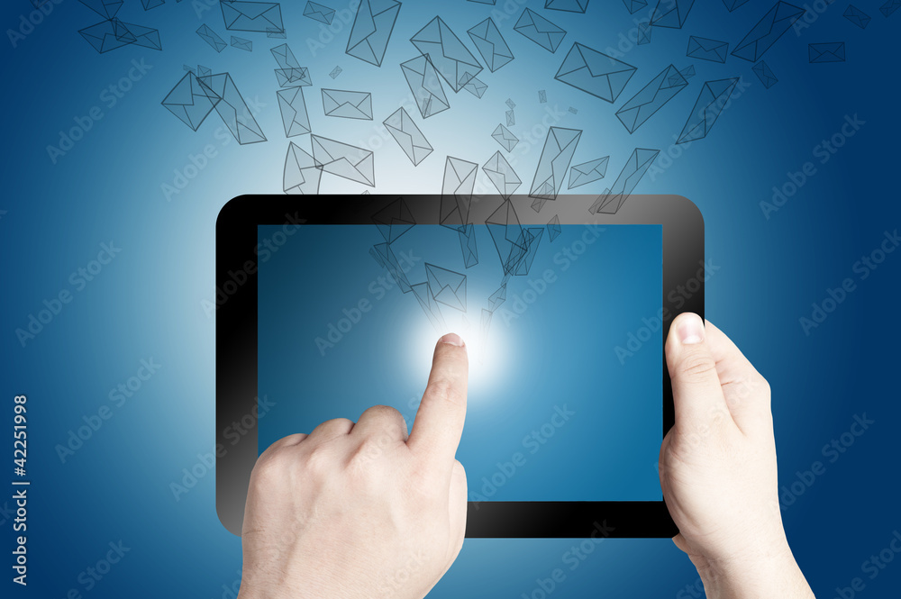 hand Holding Tablet PC with mail icon coming out hand Holding Tablet PC with mail icon coming out