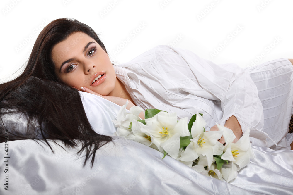 beautiful young girl with tulips,isolated on a white background beautiful young girl with tulips,isolated on a white background