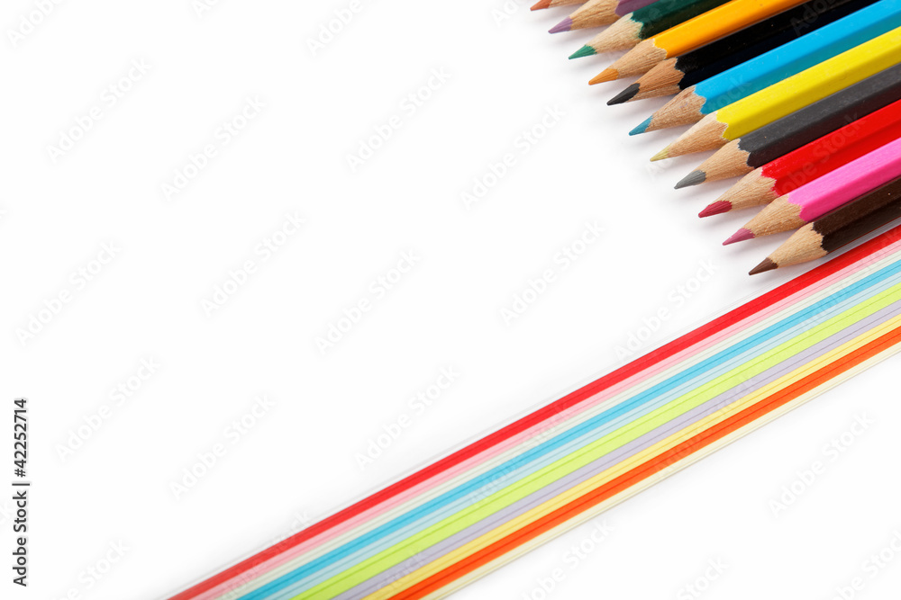 Colored pencils on a white background. Colored pencils on a white background.