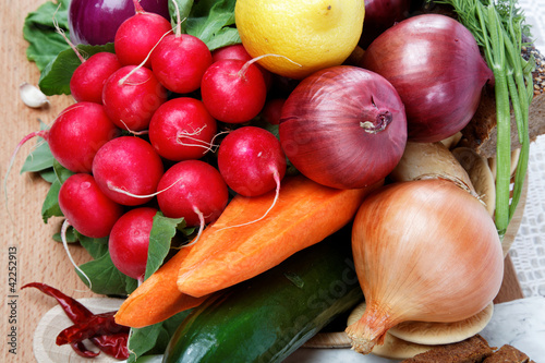 Fototapeta Naklejka Na Ścianę i Meble -  Healthy food. Fresh vegetables and fruits on a wooden board.