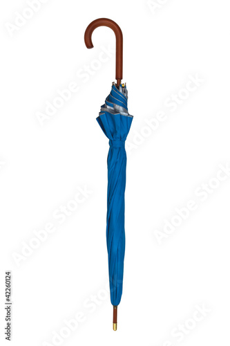 blue umbrella isolated on a white background with a brown wood h