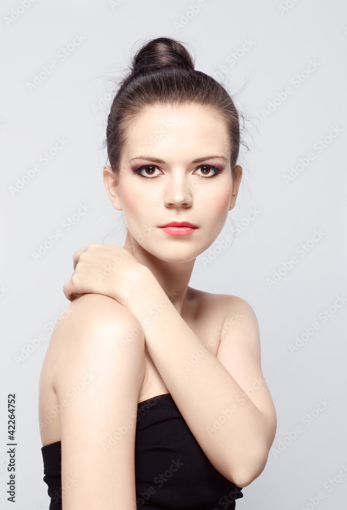 attractive young brunette with perfect skin and bright makeup attractive young brunette with perfect skin and bright makeup