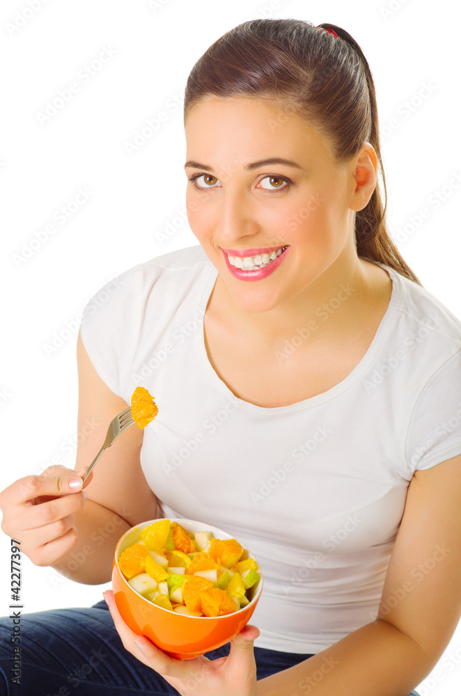 Young girl eat fruit salad Young girl eat fruit salad