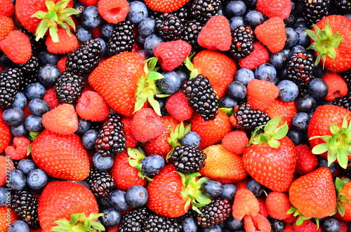 Fototapeta Naklejka Na Ścianę i Meble -  Blackberries Strawberries Blueberries and Raspberries