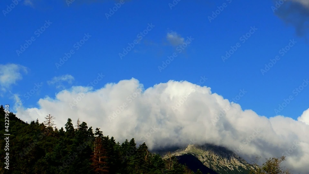 Oligyrtos summit under the clouds, time lapse Oligyrtos summit under the clouds, time lapse