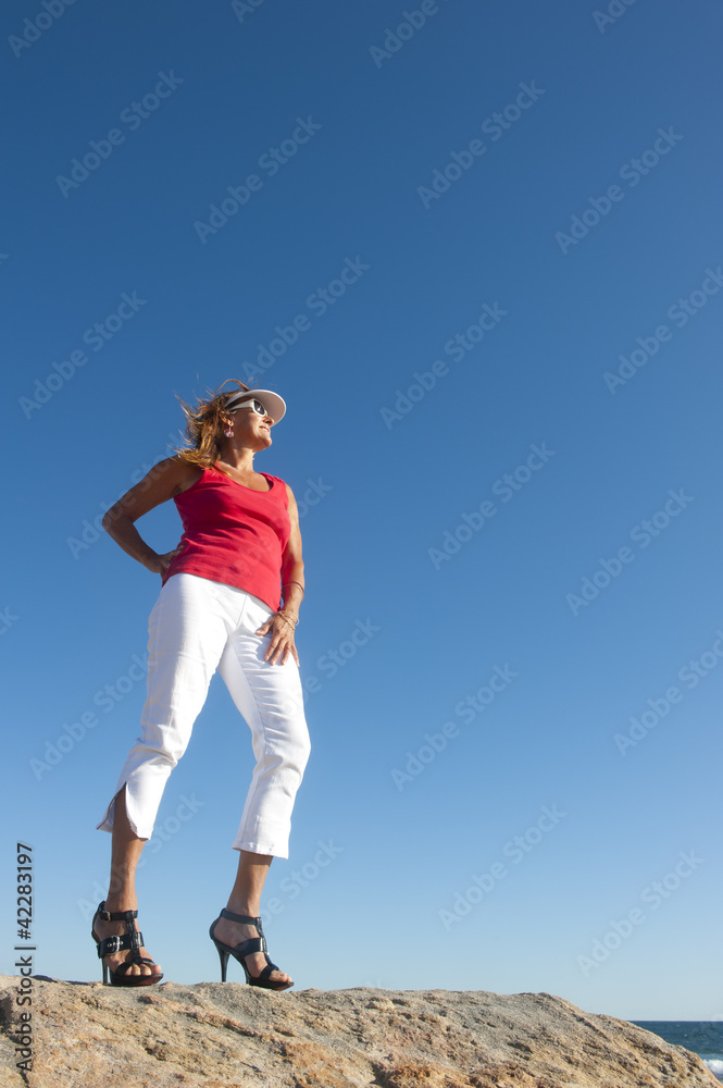 Sexy high heel lady at lookout over ocean Sexy high heel lady at lookout over ocean