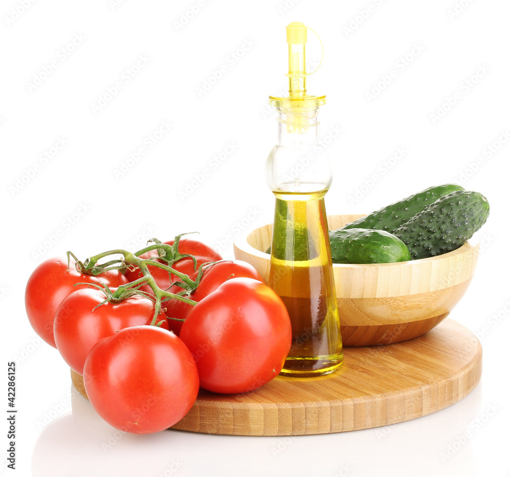 Fototapeta premium Tomatoes and cucumbers with oil