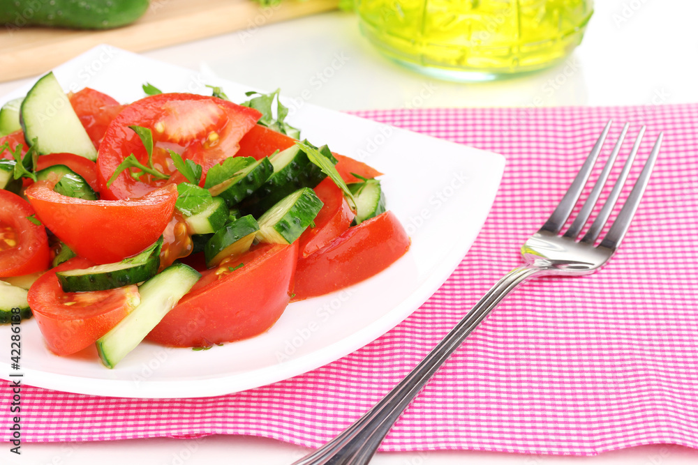 Fresh salad with tomatoes and cucumbers Fresh salad with tomatoes and cucumbers