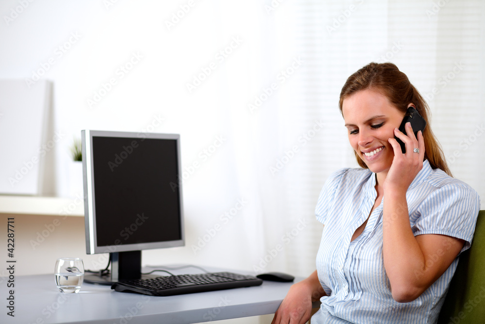 Young attractive executive woman on cellphone Young attractive executive woman on cellphone