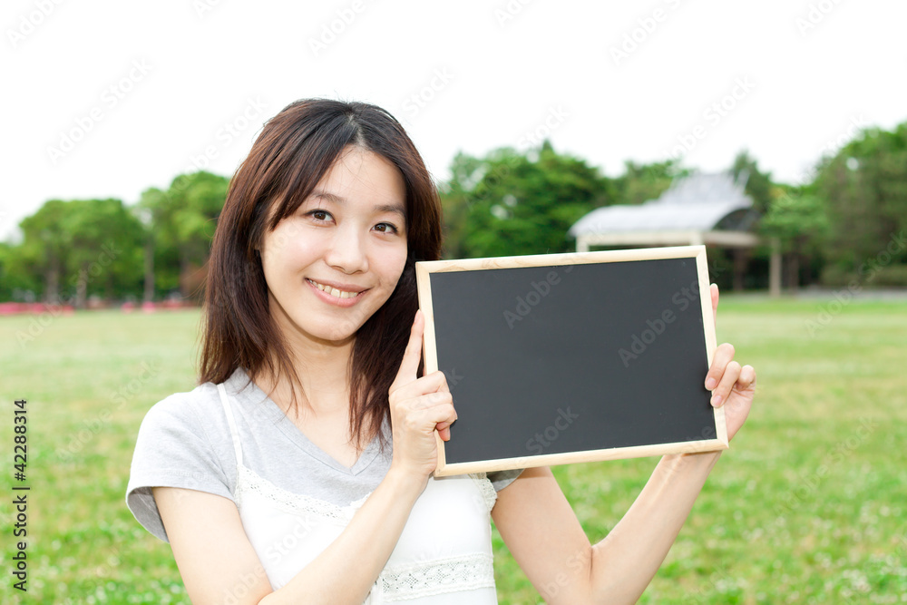 Beautiful young woman with message board. Portrait of asian. Beautiful young woman with message board. Portrait of asian.