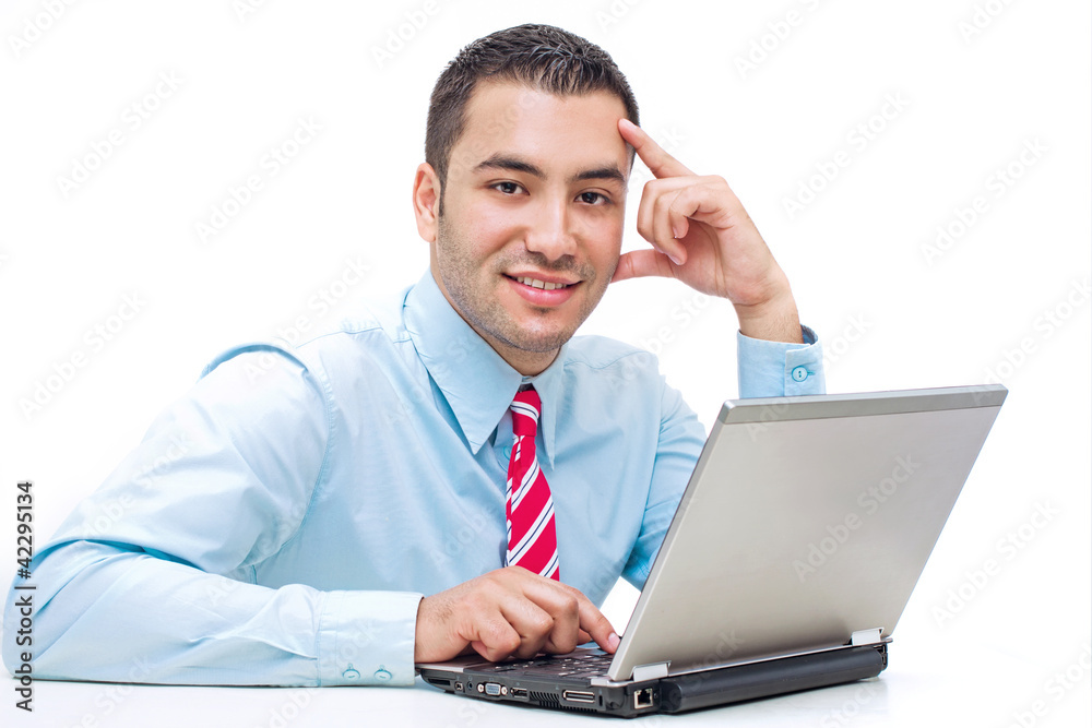 Handsome businessman with laptop. studio shot Handsome businessman with laptop. studio shot
