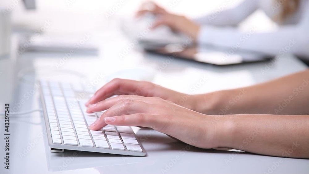 hands that write on the computer keyboard hands that write on the computer keyboard