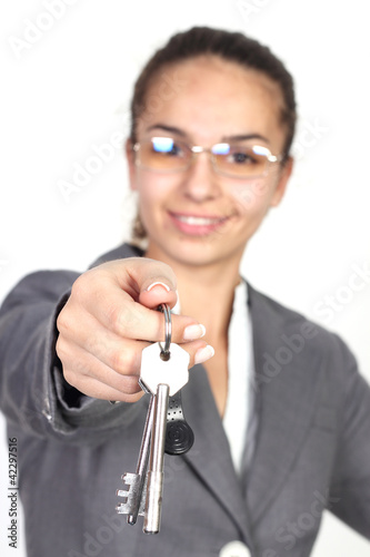 Businesswoman giving you keys