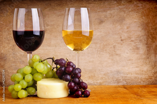 still life with wine, cheese and grapes