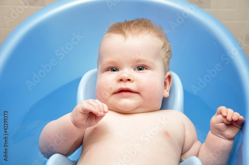 A small child in the bathtub