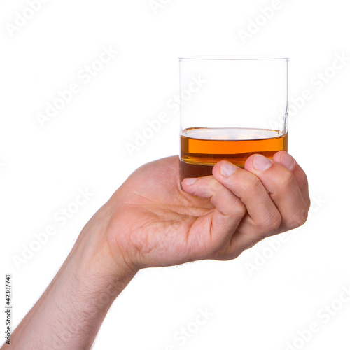 Glass of whisky in hand