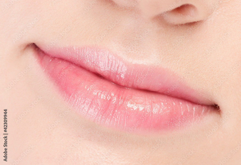 Close-up face of beauty young woman. Lips zone Close-up face of beauty young woman. Lips zone