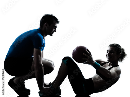 man woman exercising weights workout fitness ball © snaptitude