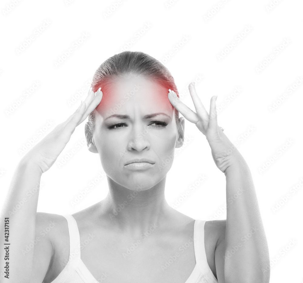 A young Caucasian woman suffering from a headache A young Caucasian woman suffering from a headache