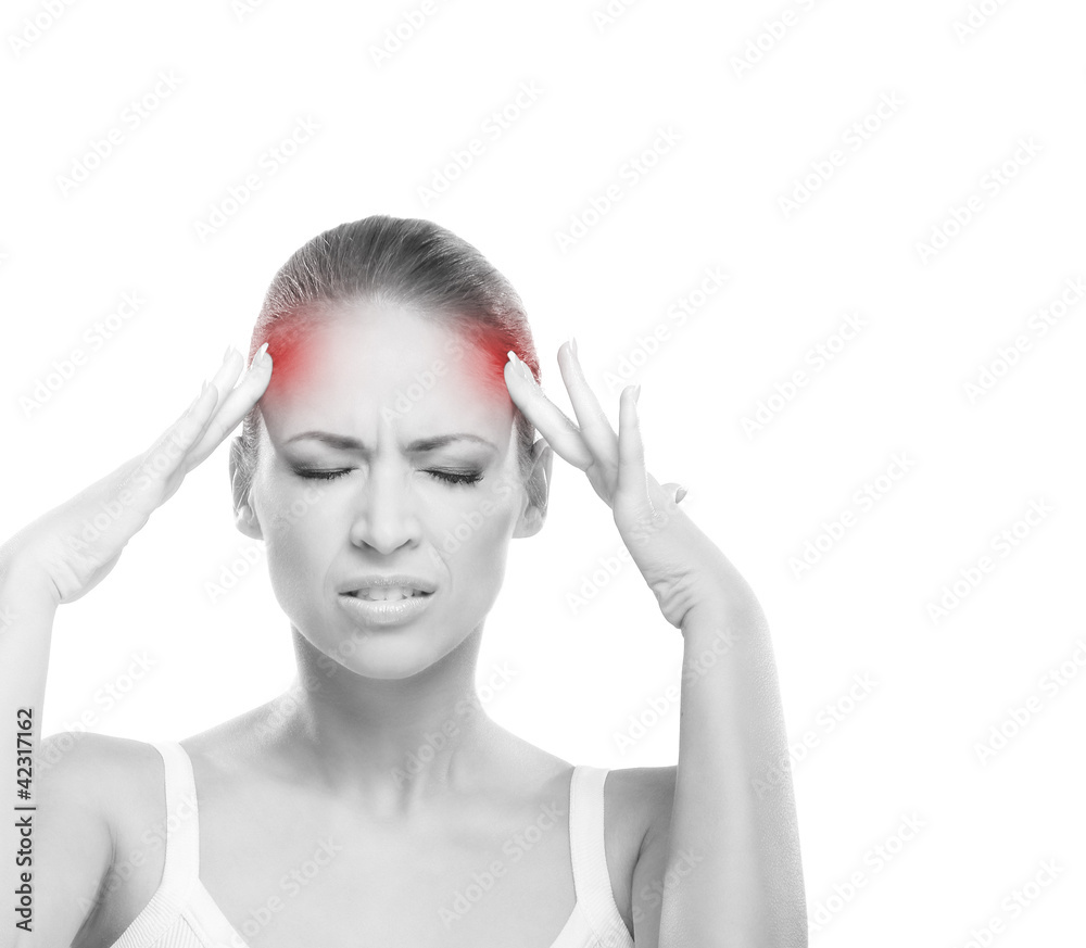 A young Caucasian woman suffering from a headache A young Caucasian woman suffering from a headache