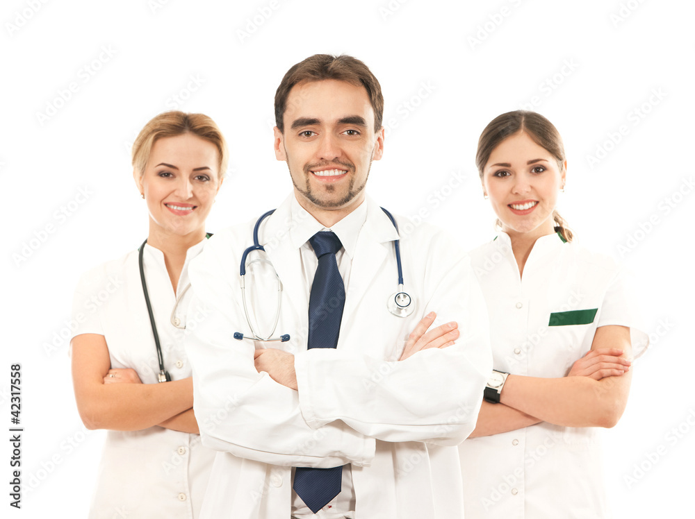 A team of three young Caucasian doctors in white clothes A team of three young Caucasian doctors in white clothes