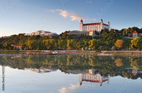Bratislava castle with reflection in river Danube - Slovakia
