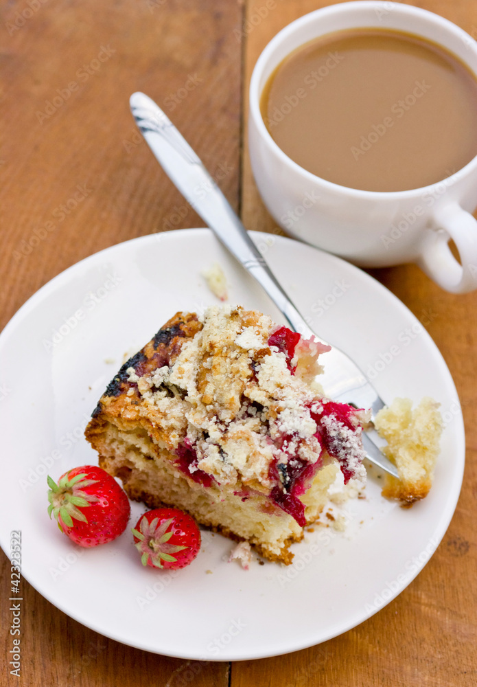 Biscuit cake with berries and sugar crust