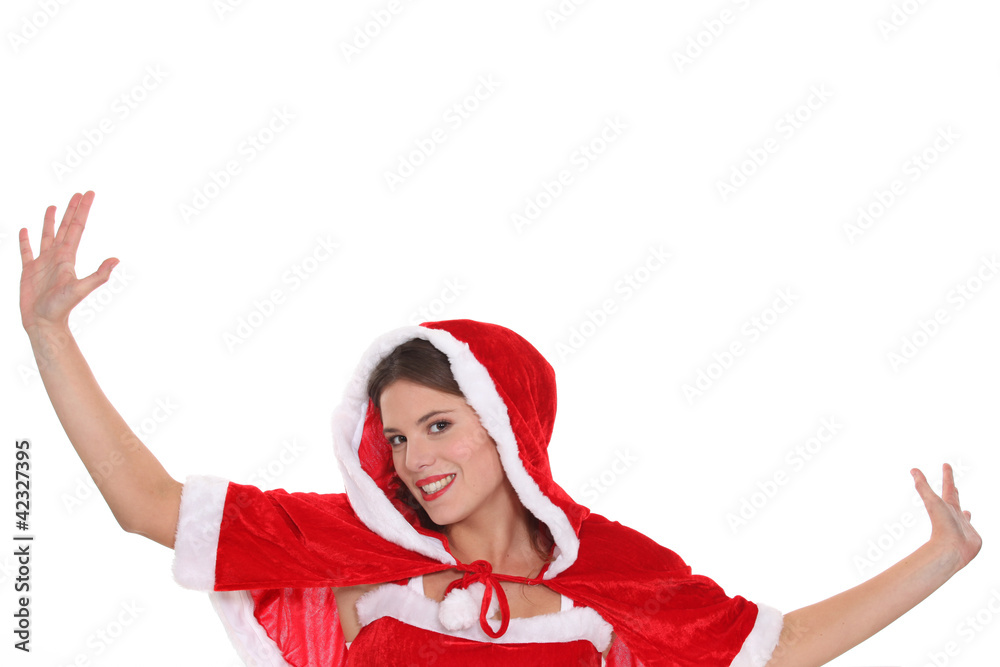 Young woman dressed in a cute Christmas outfit Young woman dressed in a cute Christmas outfit