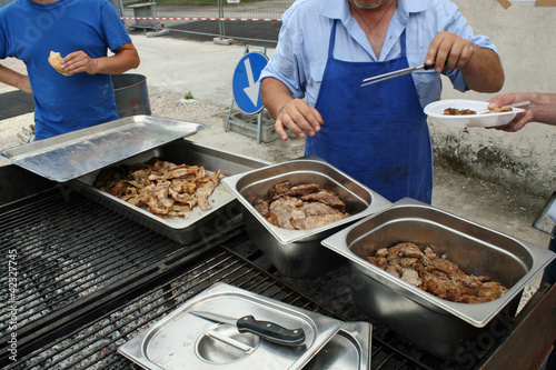 asty barbecued meat during a festivity with barbecue
