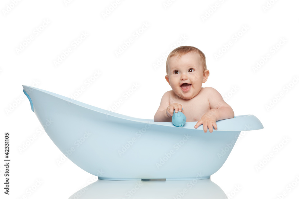 Girl in blue bath tub on white background Girl in blue bath tub on white background
