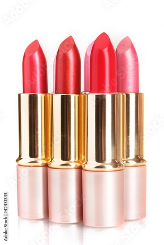 beautiful lipsticks isolated on white