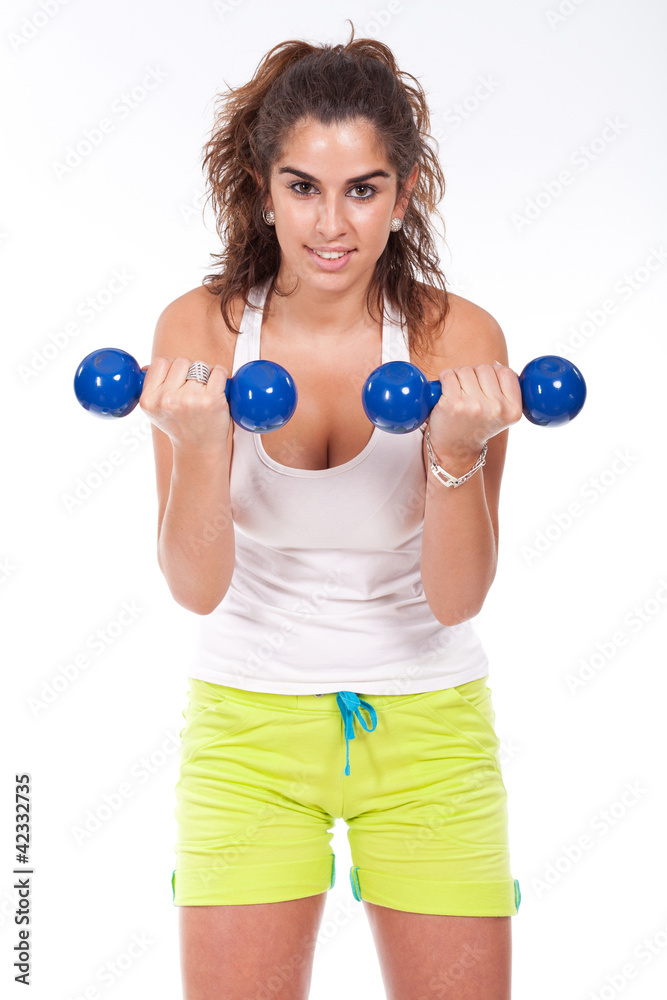 sporty muscular woman working out with two dumbbells sporty muscular woman working out with two dumbbells