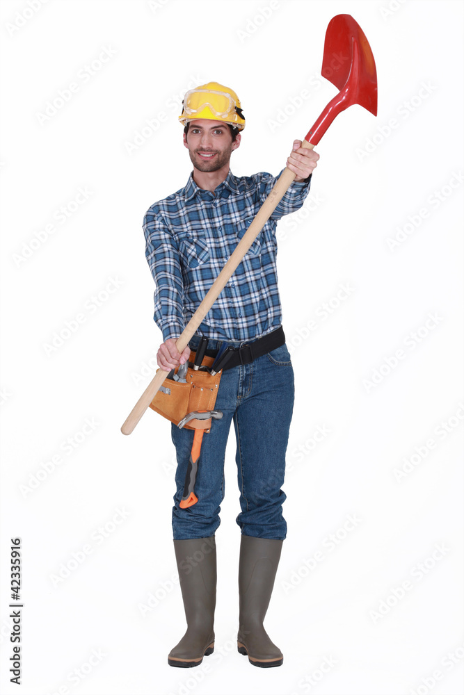 Laborer on white background showing shovel Laborer on white background showing shovel